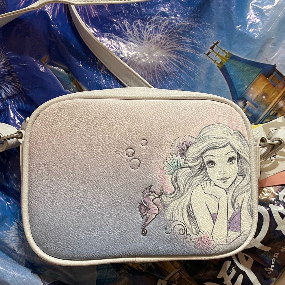 Danielle Nicole White Crossbody Bag with Artistic Mermaid Design Disney